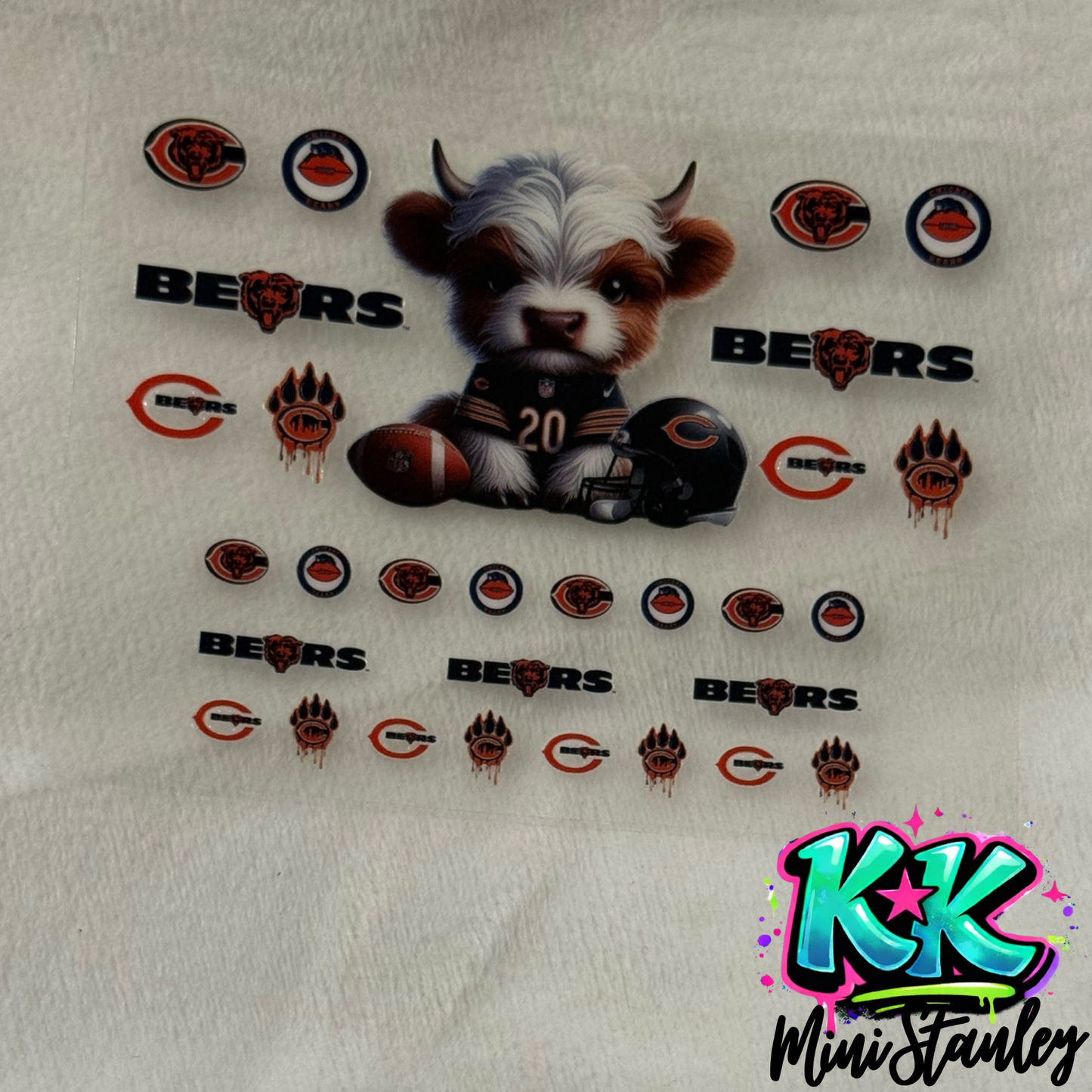 A sheet of Chicago Bears themed UV DTF adhesive decals featuring a mascot and team logos.