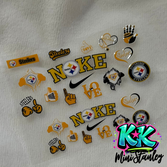 A sheet of Pittsburgh Steelers themed UV DTF adhesive decals for mini keychains.