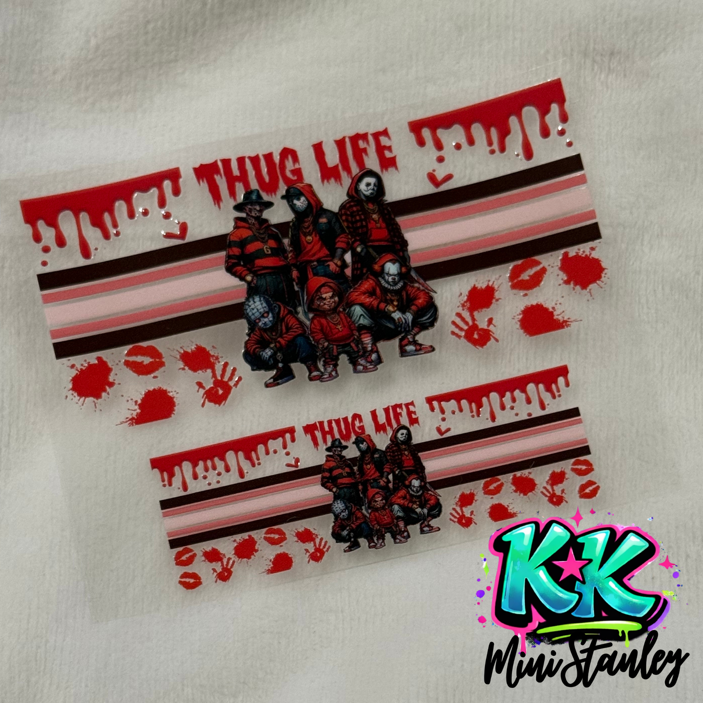 Two horror-themed UV DTF adhesive wraps featuring iconic movie villains and blood splatter designs.