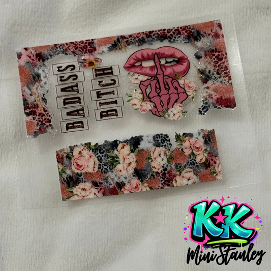 A UV DTF adhesive wrap featuring a floral leopard print, pink lips, and the text Badass Bitch.