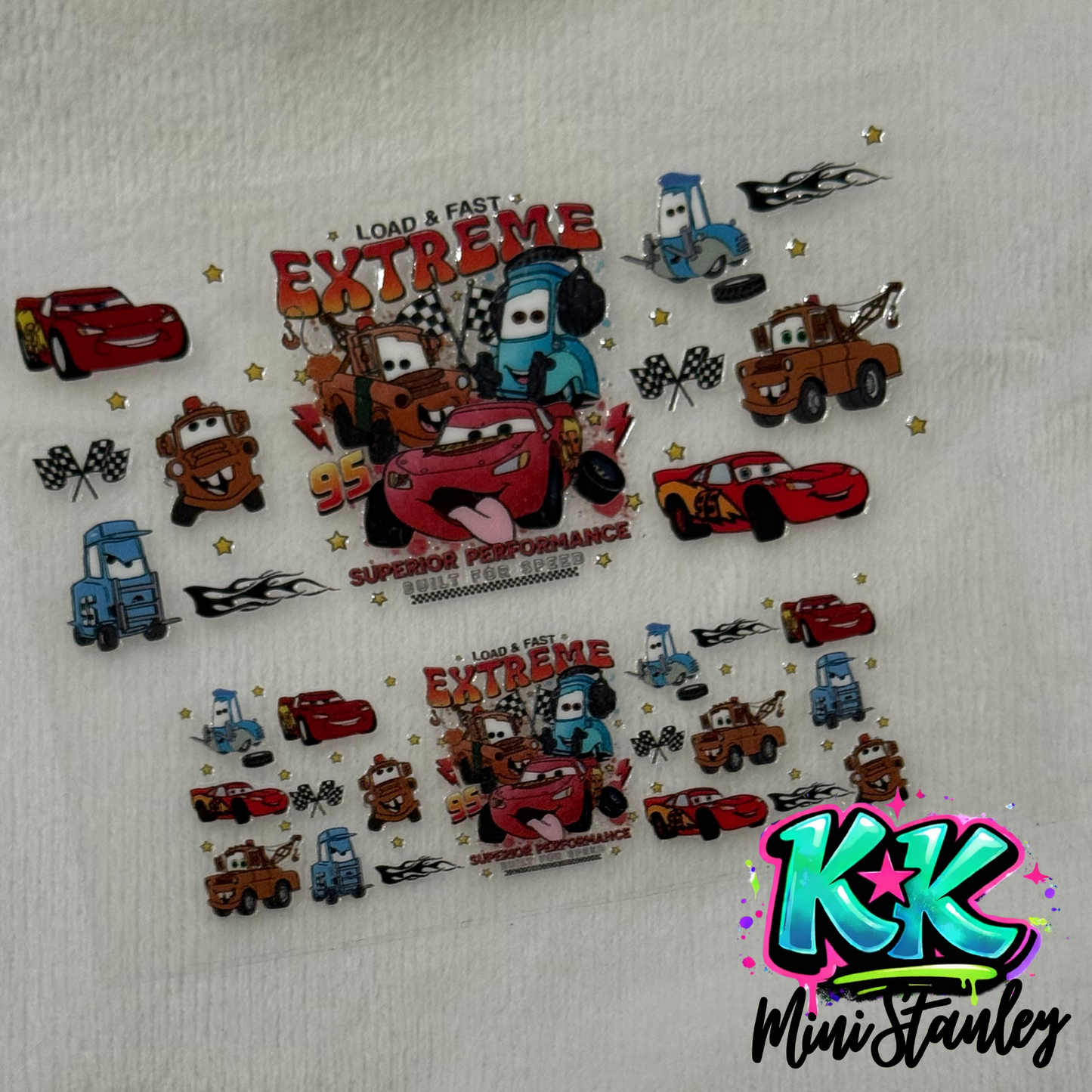 Two sheets of UV DTF adhesive decals featuring Cars movie characters and racing motifs.
