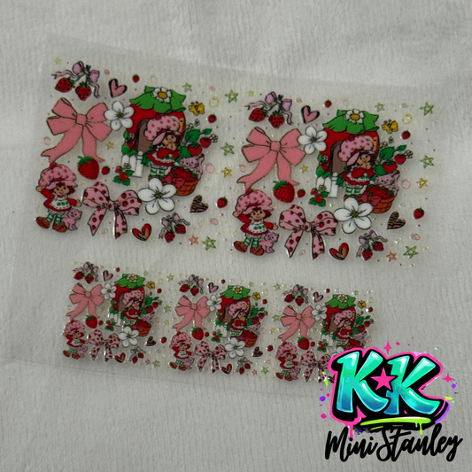 Two sheets of Strawberry Shortcake themed UV DTF adhesive decals for mini cup keychains.