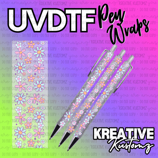 A floral UV DTF adhesive pen wrap featuring colorful daisy patterns on a clear background.