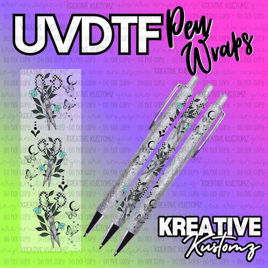 A UV DTF adhesive pen wrap featuring a black and white scissor design with teal floral accents.