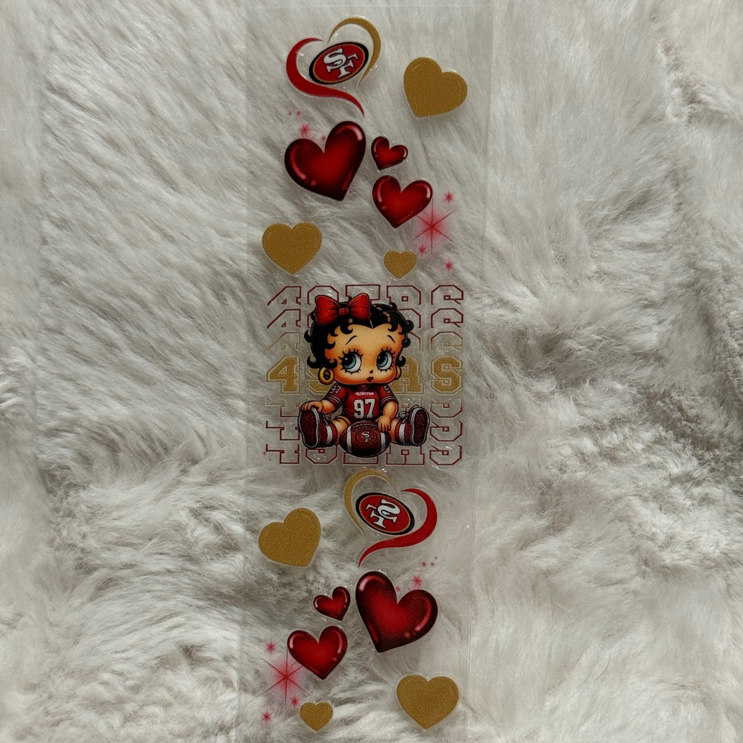 A rectangular UV DTF pen wrap featuring a Betty Boop character, 49ers logos, and red and gold hearts.