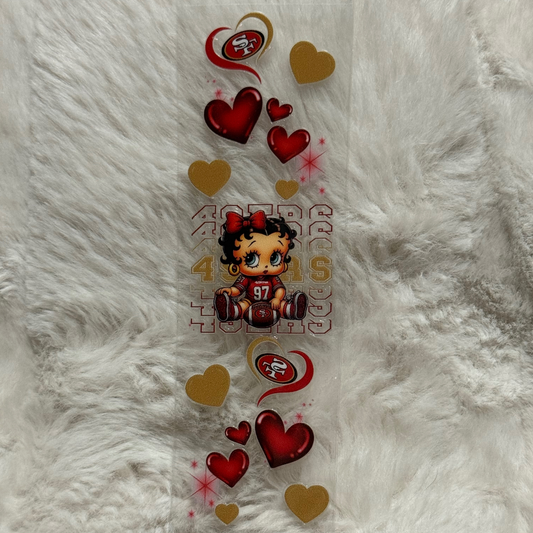 A rectangular UV DTF pen wrap featuring a Betty Boop character, 49ers logos, and red and gold hearts.
