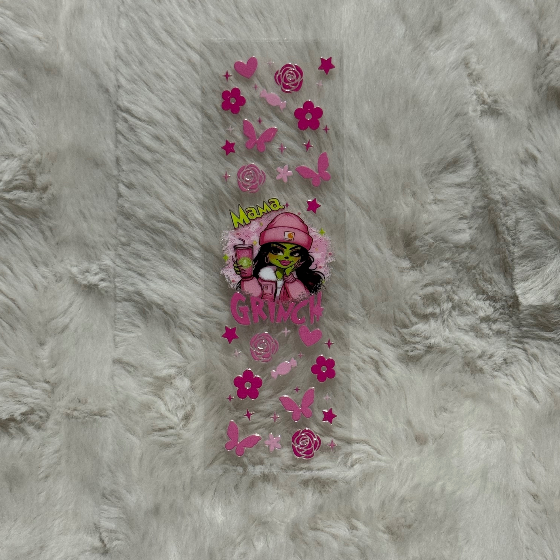 A rectangular UV DTF pen wrap featuring a Mama Grinch design with pink flowers and butterflies.