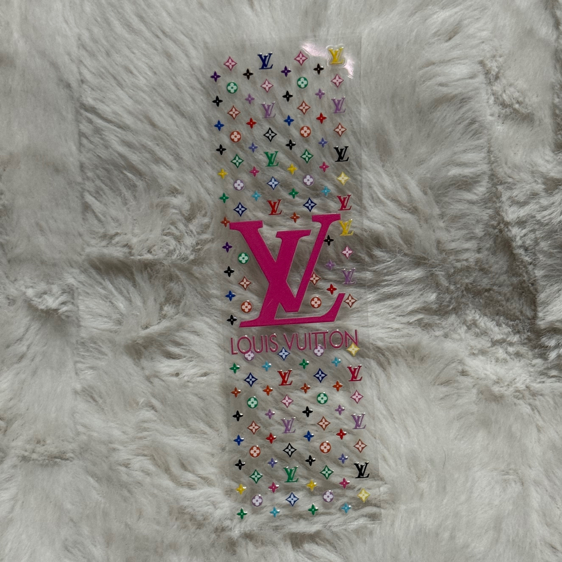 A rectangular UV DTF adhesive pen wrap featuring a colorful Louis Vuitton monogram pattern.