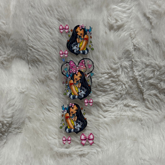 A clear UV DTF pen wrap featuring Pocahontas, Meeko, and pink bows on a white fur background.