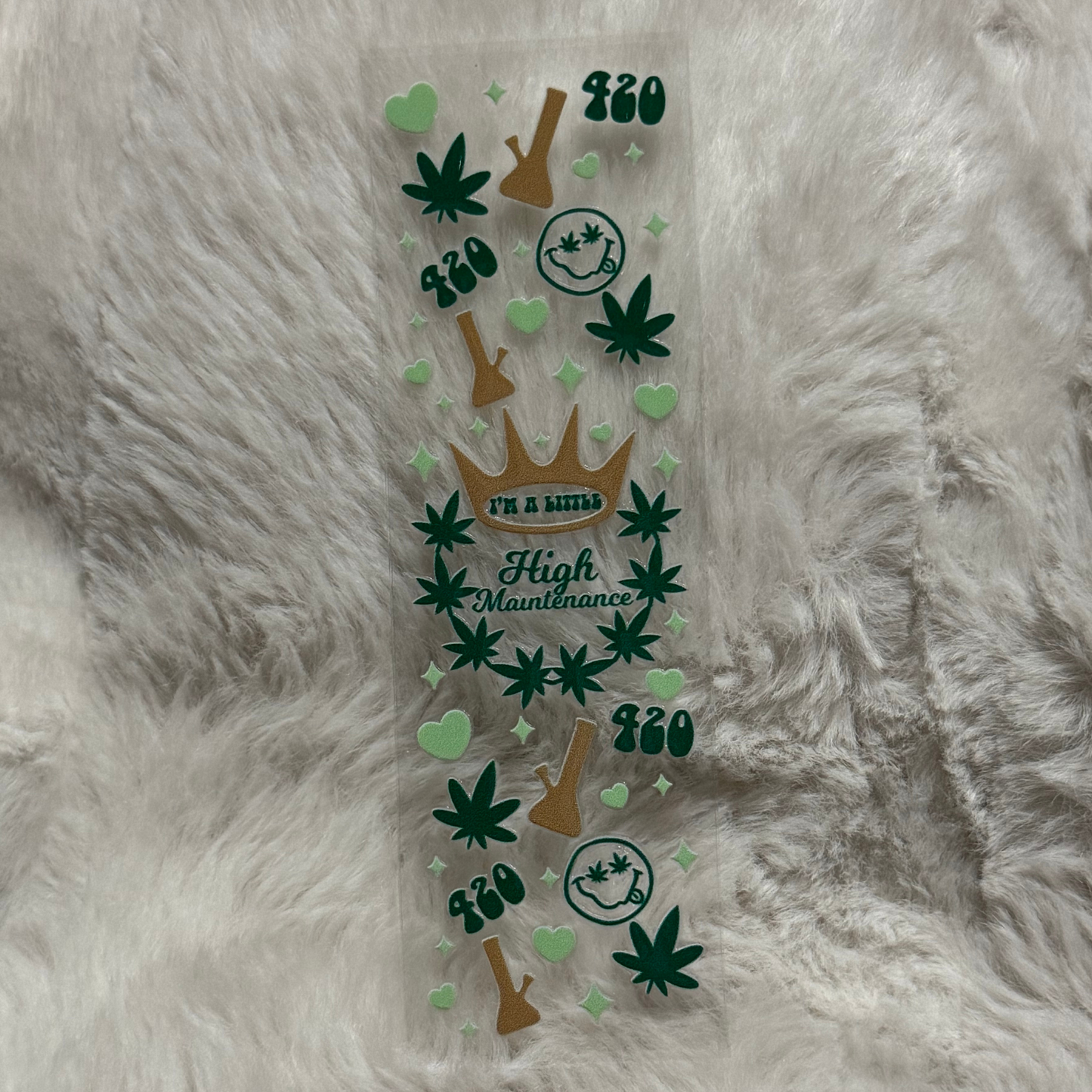 A rectangular UV DTF pen wrap featuring green cannabis leaves, bongs, and 420 text designs.