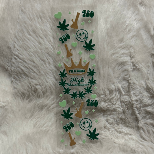 A rectangular UV DTF pen wrap featuring green cannabis leaves, bongs, and 420 text designs.