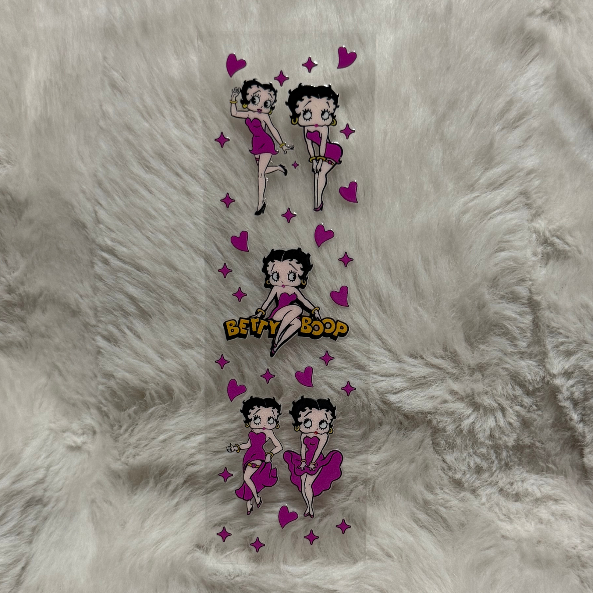 A UV DTF adhesive pen wrap featuring multiple Betty Boop illustrations and pink hearts.