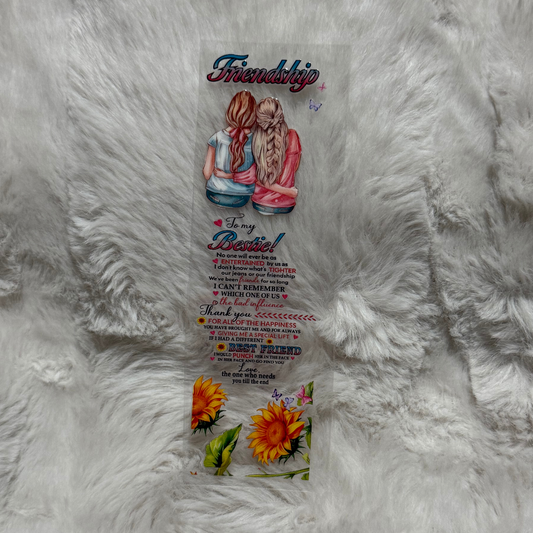 A clear adhesive pen wrap featuring an illustration of two friends and sunflower accents.