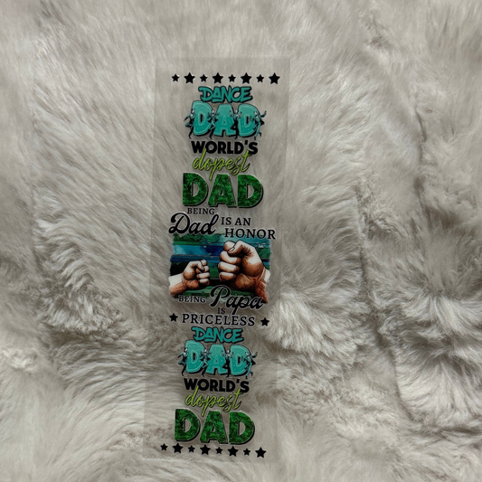 A rectangular UV DTF pen wrap featuring Dance Dad text, fist bumps, and stars on a clear backing.