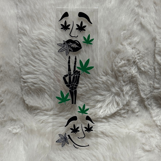 A UV DTF adhesive pen wrap featuring skeleton hands, lips, and cannabis leaf designs.