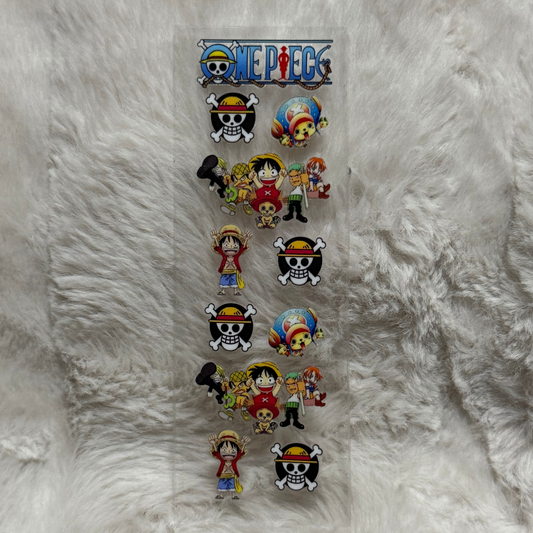 A rectangular UV DTF adhesive pen wrap featuring One Piece character and logo designs.