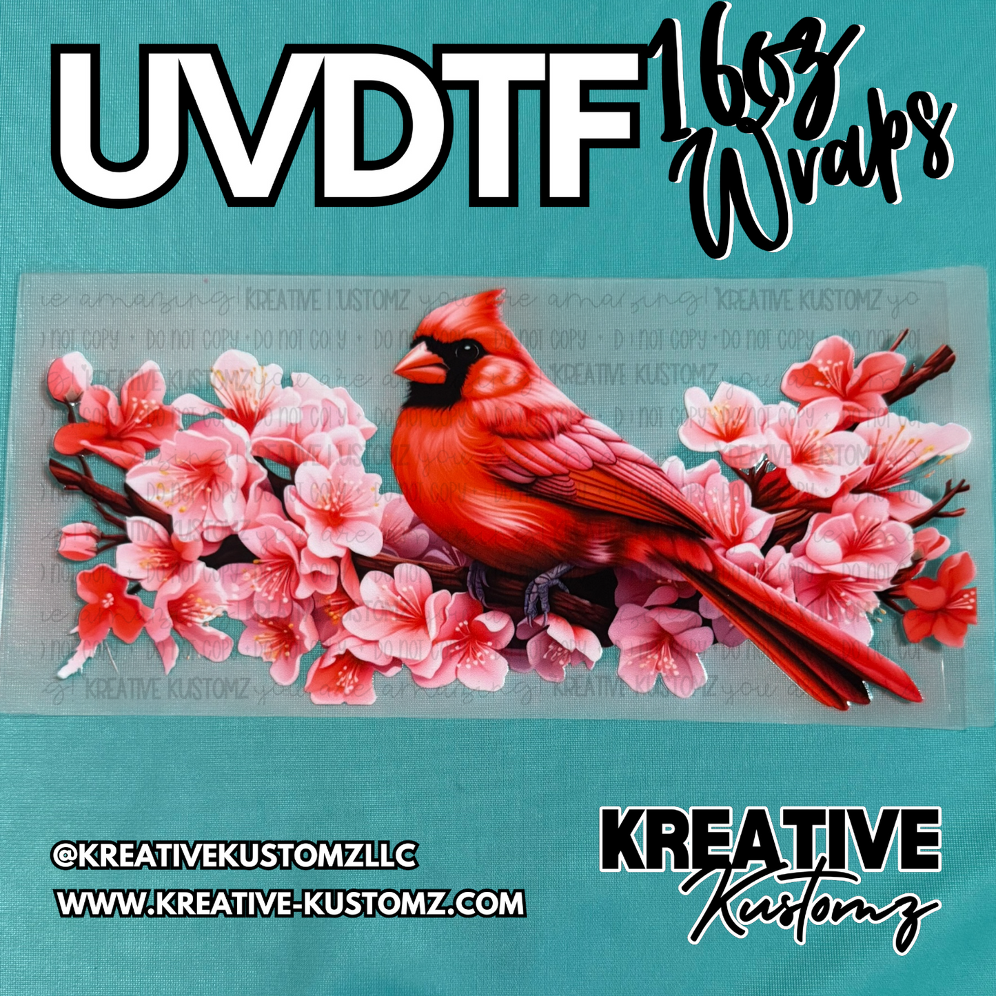 A UV DTF adhesive cup wrap featuring a red cardinal perched on a branch of pink cherry blossoms.