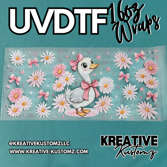 A UV DTF cup wrap featuring a duck with a pink bow surrounded by pink daisies and small bows.