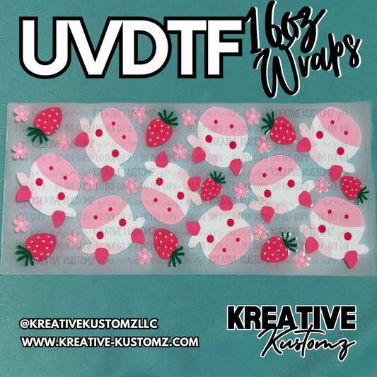 A UV DTF cup wrap featuring a repeating pattern of pink cows, strawberries, and small flowers.
