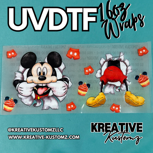 A UV DTF cup wrap featuring Mickey Mouse peeking through torn paper with cupcakes and shorts.