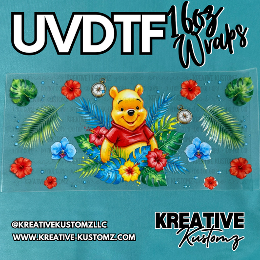A UV DTF cup wrap featuring Winnie the Pooh surrounded by tropical flowers and leaves.