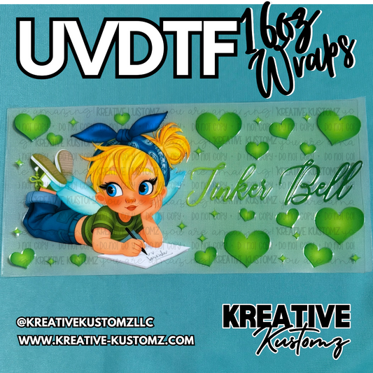 A UV DTF cup wrap featuring a cartoon fairy writing on paper surrounded by green hearts.