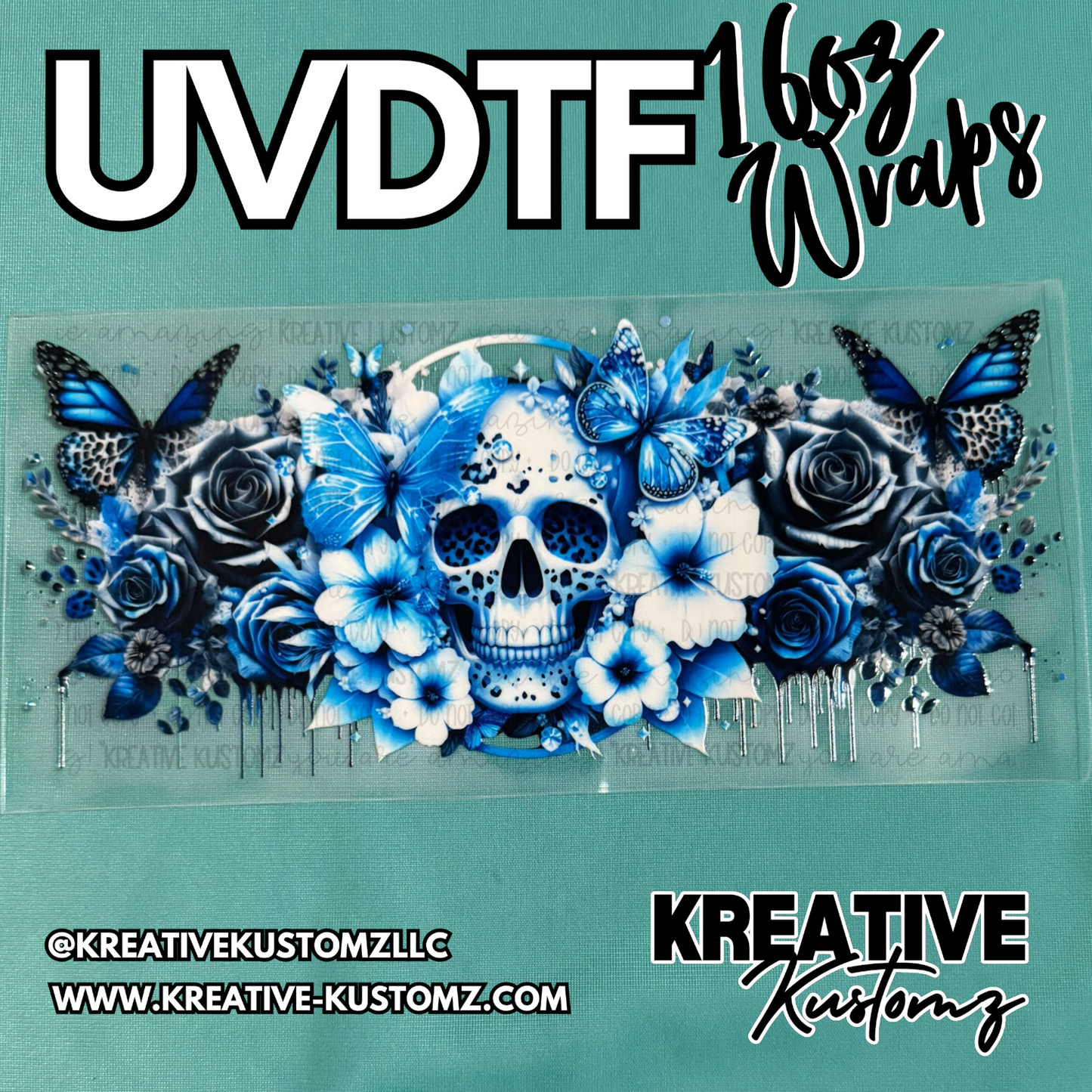 A blue floral and skull themed UV DTF adhesive wrap for a 16oz glass cup.