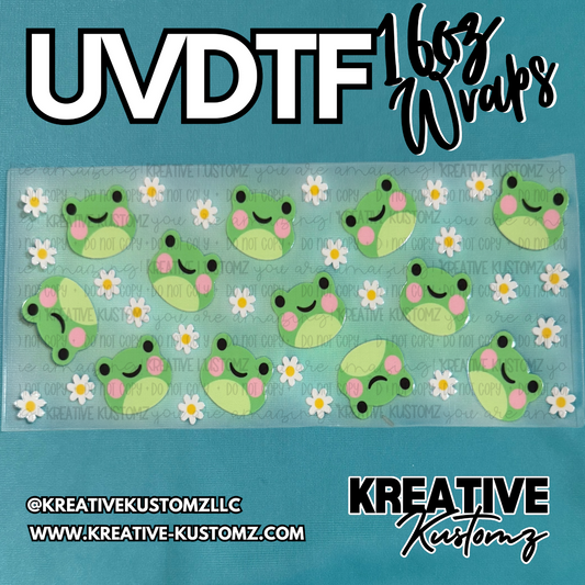 A clear adhesive cup wrap featuring a pattern of cartoon frogs and white daisies.